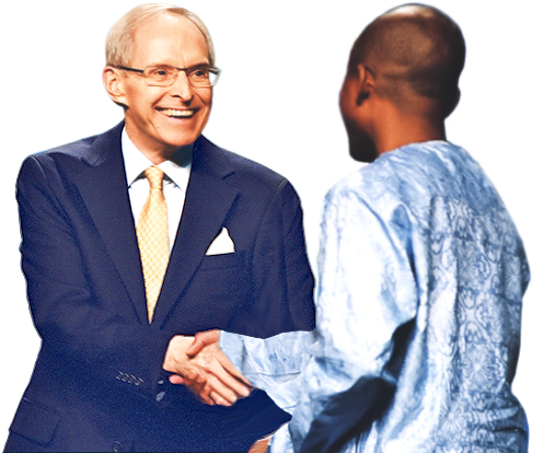Sri Harold Klemp shaking hands with someone
